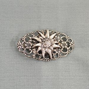 filigree designed brooch