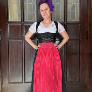 Black dirndl with red apron