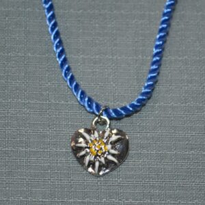 child's edelweiss and heart necklace