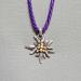 purple corded edelweiss necklace