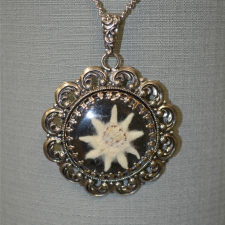 Round Edelweiss necklace with Black backing